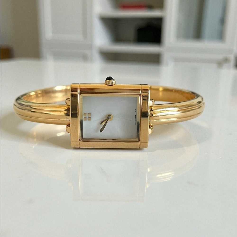 Vintage Yves Saint Laurent Bangle Watch – Gold Plated, Mother of Pearl Dial
